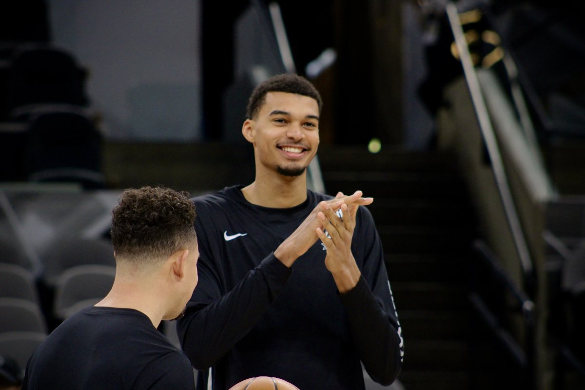 Jan 4, 2024; San Antonio, Texas, USA; San Antonio Spurs rookie Victor Wembanyama (1) smiles while fans sing him 'Happy Birthday' prior to facing the Milwaukee Bucks.